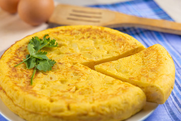 Spanish potato omelette dish with egg ready to eat