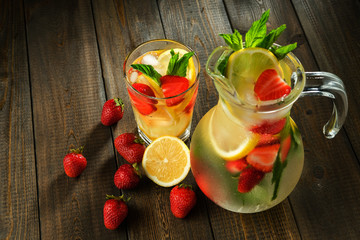 Lemonade with lemon and strawberry, mint and ice