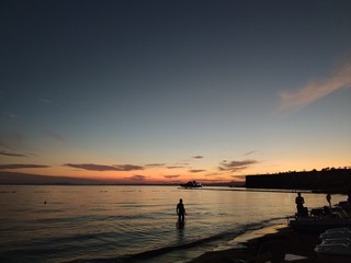 Naklejka na ściany i meble evening with a sea lagoon on the beach