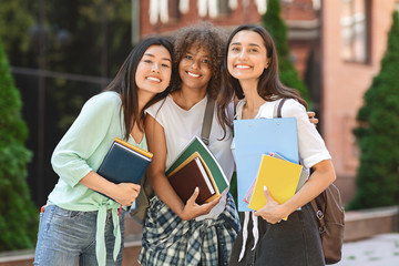 Female Students. Portrait Of Happy Girls University Friends Posing Together Outdoors
