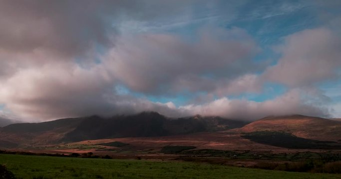 Spectacular and picturesque 4K video of Brandon mountain ridge with moving clouds and shadows, Dingle Peninsula, Ireland