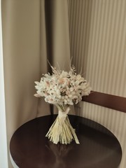 bridal wedding bouquet of flowers with decor