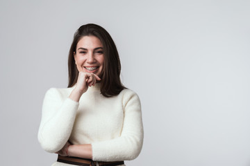 Happy beautiful young brunette woman