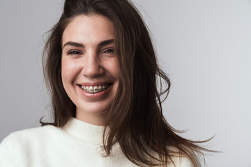 Happy beautiful young brunette woman