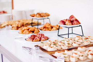 Pastry buffet served at charity event, sweet food and dessert table