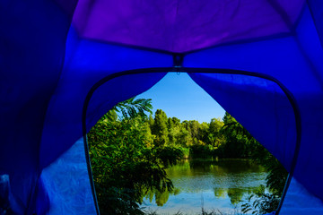 View on a river from tent in morning