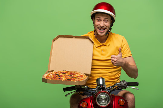 Smiling Delivery Man In Yellow Uniform On Scooter With Pizza Showing Thumb Up Isolated On Green