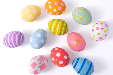 Top View. Creative layout  Easter paint colorful  Eggs various pattern handmade on isolated white background.copy space.
