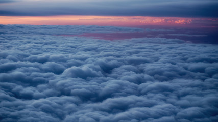 Obraz premium Sea of clouds in the morning surise from an airplane