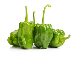 fresh green bell pepper (capsicum) on a white background