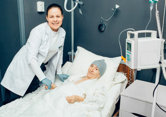 Oncologist is very pleased with the good results of treating cancer in an elderly woman patient....