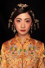 Asian retro women's wear in dark background