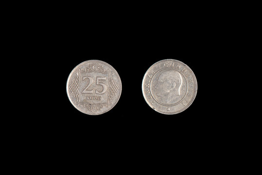 25 Turkish kurus coin, 2009, both sides. Black background.