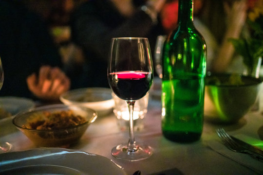 moody dark wine dinner picture