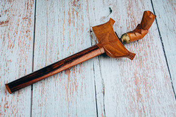 Traditional dagger called Keris on wooden background, Keris  is unique icon among Malay Ethnic cultural history in Malaysia