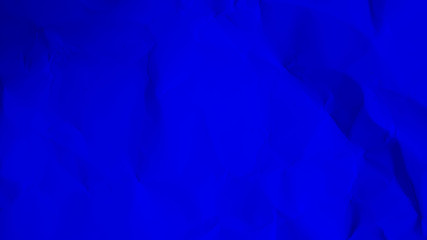 blue paper background. crumpled blue cardboard texture