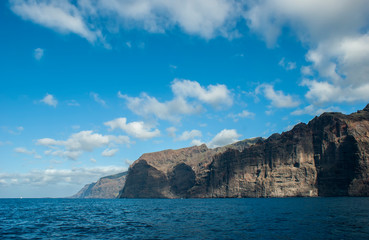 Fototapeta na wymiar Huge majestic cliffs of Los Gigantes. Only the sea and the rocks.