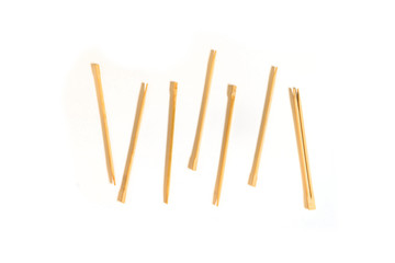 bunch of simple wooden chopsticks flat lay isolated on the table