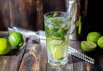 Cocktail mojito with lime, mint and ice. Recipe. Alcohol. Summer drink. Vegetarianism. Health.