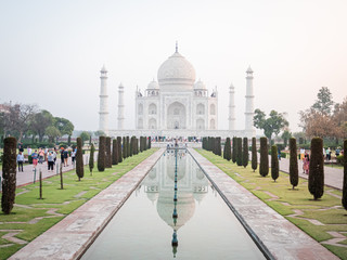 beautiful taj mahal in Agra india with people in front