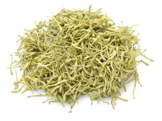 dried honeysuckle flowers on the white background 