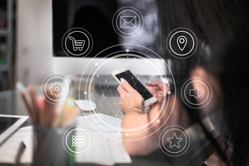 With phone and digital tablet.