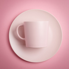 Empty pink Mug on pink background with copy space