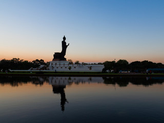 Fototapeta premium Standing Buddha statue in Thailand
