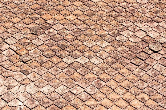 Antique brown roof tiles are used for roofing of homes, temples and general buildings. Found in many parts of Asia, Thailand, Laos, Myanmar. Meet Jay, wanting nowadays.
