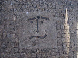 Artistic graffiti street art on the road, Porto, Portugal