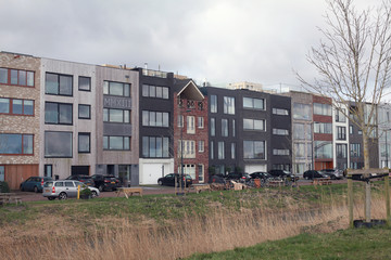Newly builded residential street with modern design on the Zeeburgereiland, Amsterdam