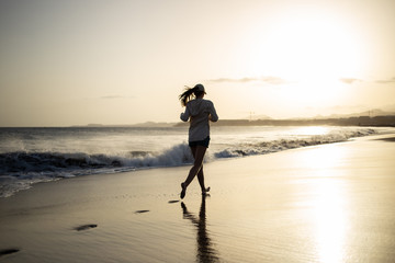 Young woman having fun at the ocean beach