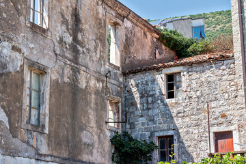 Fototapeta premium Facade of a destroyed house