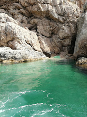 A collection of natural seascapes, mountain valleys, and lagoons without people.