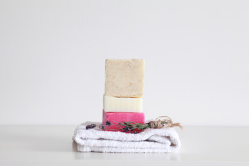 Pieces of hard soap bar or shaving soap or shampoo bar in a zero waste minimalist bathroom