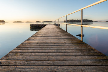 Obraz premium wooden bridge on the lake