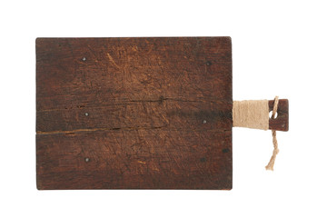 very old brown rectangular wooden kitchen cutting board with handle