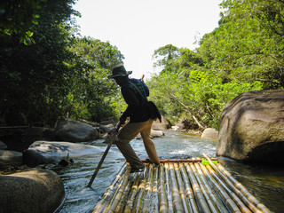 River alloy in Thailand jungle on bamboo bundle
