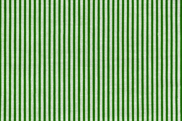 Green and white striped fabric texture. Bright colored cotton background