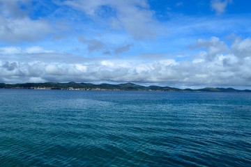  Calm sea with distant water mountains in Croatia