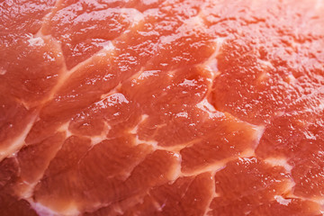 Pork fillet in a cut, close-up. Abstract macro photo of food. Copyspace.