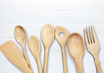 Kitchen metal and wooden cutlery on desk