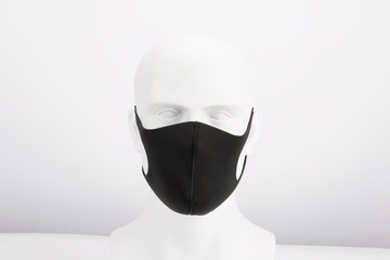 The concept of black mask, coronavirus and air pollution PM2.5. Coronavirus and epidemic virus symptoms. Wearing a good mask can protect yourself and your family and defeat the virus.