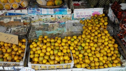 Counters and showcases with exotic tropical fruits in a warm Asian country
