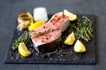 Selective focus. Salted trout. Trout steak with spices and sea salt. Salmon steak salted. Red fish....