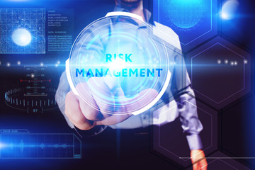 Business, Technology, Internet and network concept. Young businessman working on a virtual screen of the future and sees the inscription: