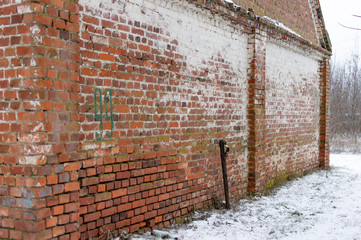 Brick wall with numbers 99 on the corner, with a hitch.