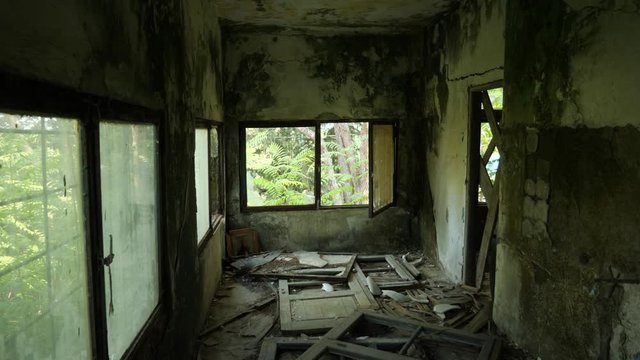 Messy interior of an abandoned sanatorium in Eleousa village, Rhodes, Greece
