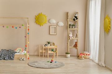 Child room concept with wooden furniture design, bed cabinet and toy.