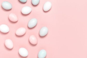 Easter pink and white eggs on a pink background, top view, flat lay, minimal style. Easter background, copy space